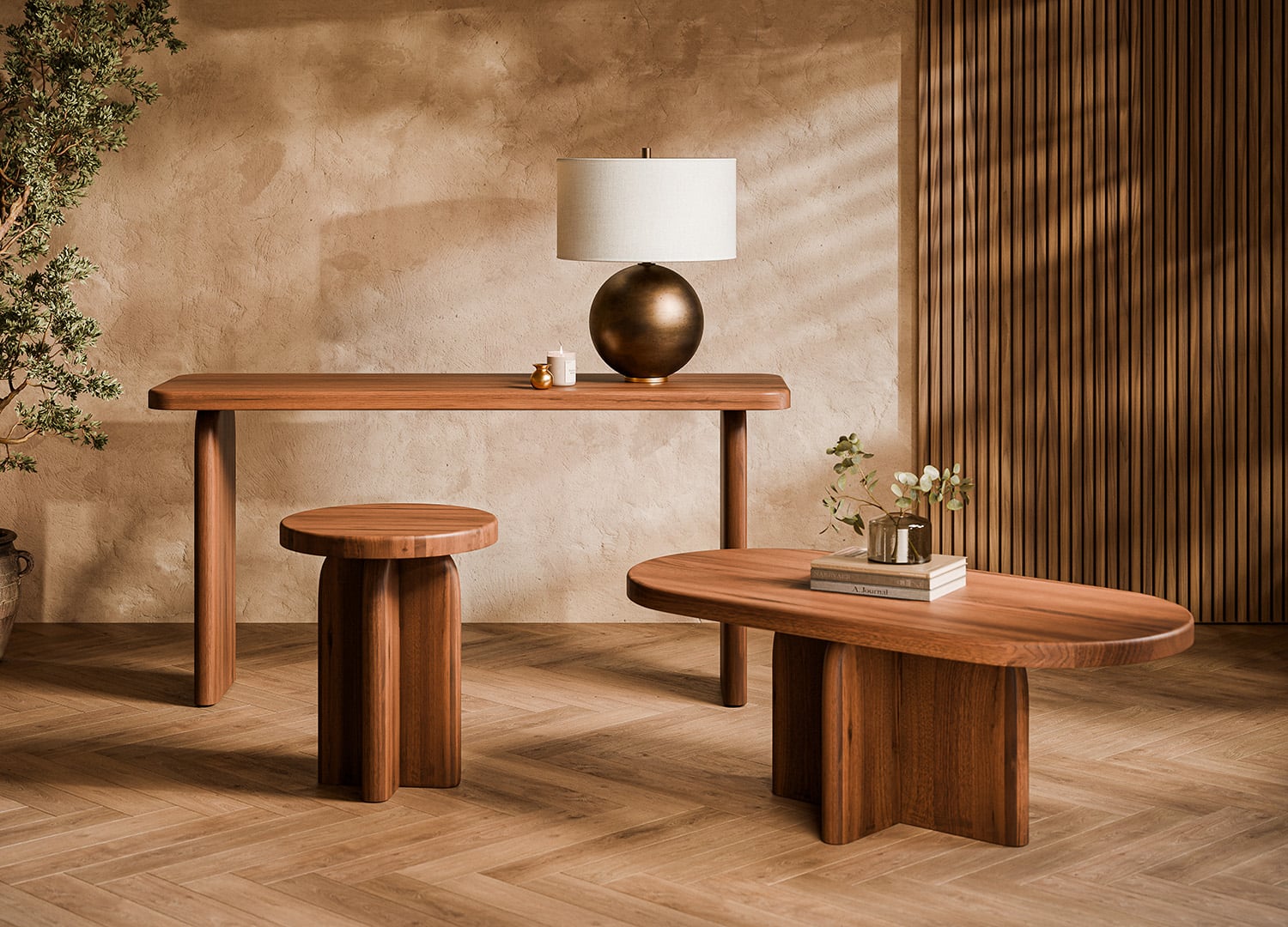 A rustic walnut console table, round side table and low bench against a fluted wood wall