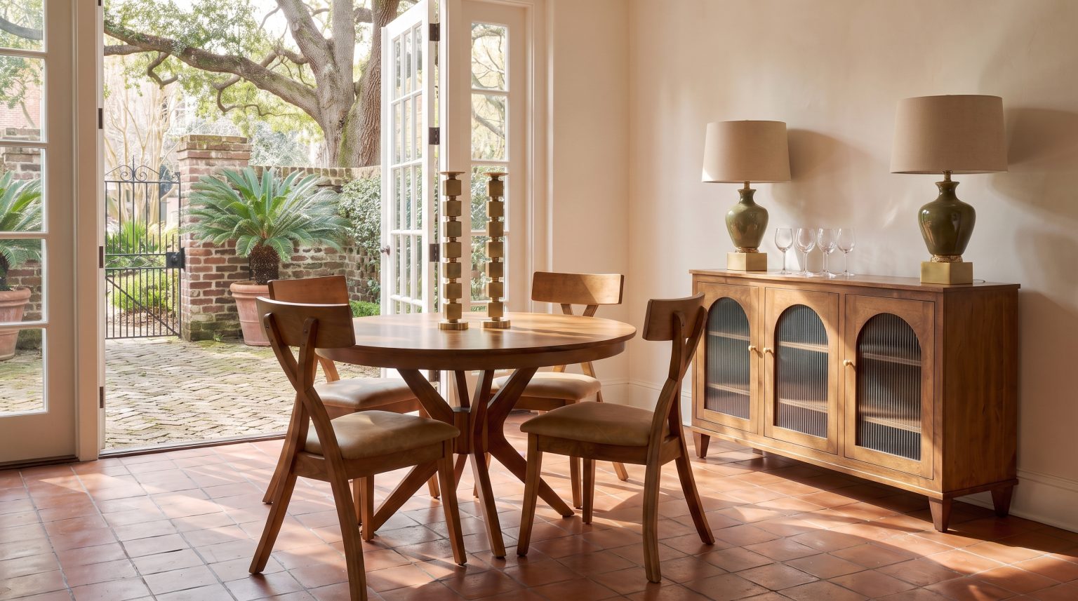 The round pedestal table: A honey top on a splayed pedestal base.