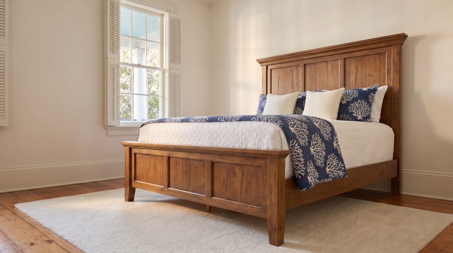 The paneled footboard: Three recessed panels to match the headboard.