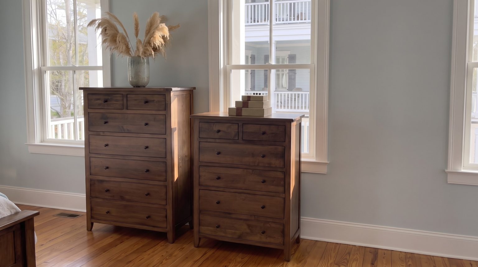Two tall chests: One taller, one wider, each with two small drawers on top.