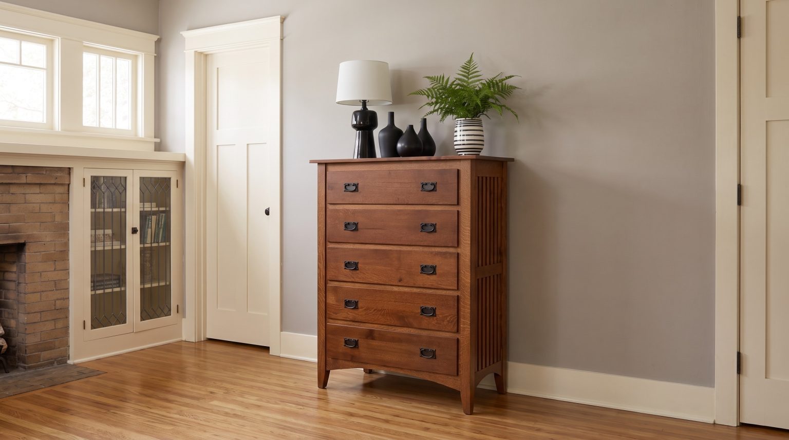 The Mission chest: Five drawers, black iron pulls, slatted sides and an arched apron.
