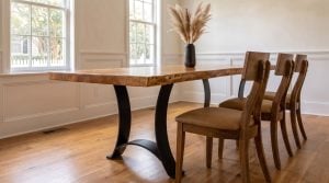 Chairs along the edge: Three chairs tucked along the live edge.