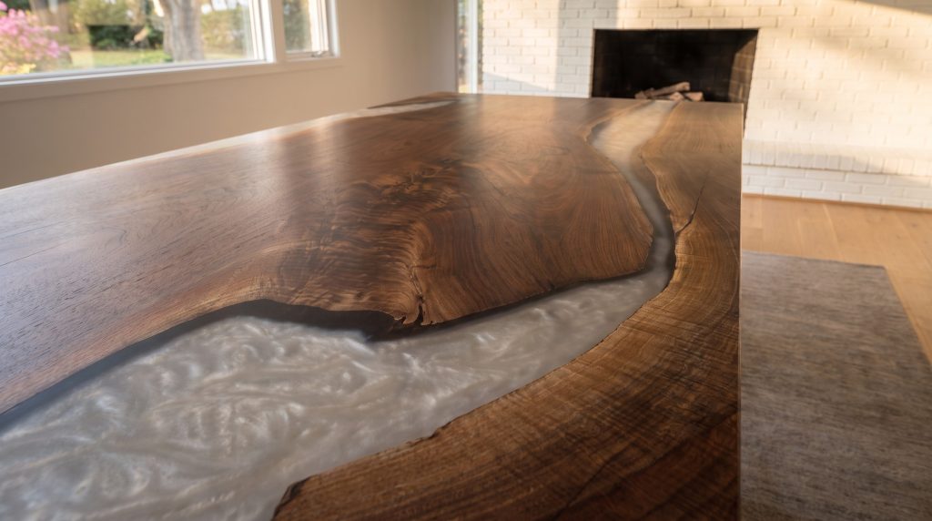 Pearl around walnut: Silver resin wrapping an island of dark walnut.