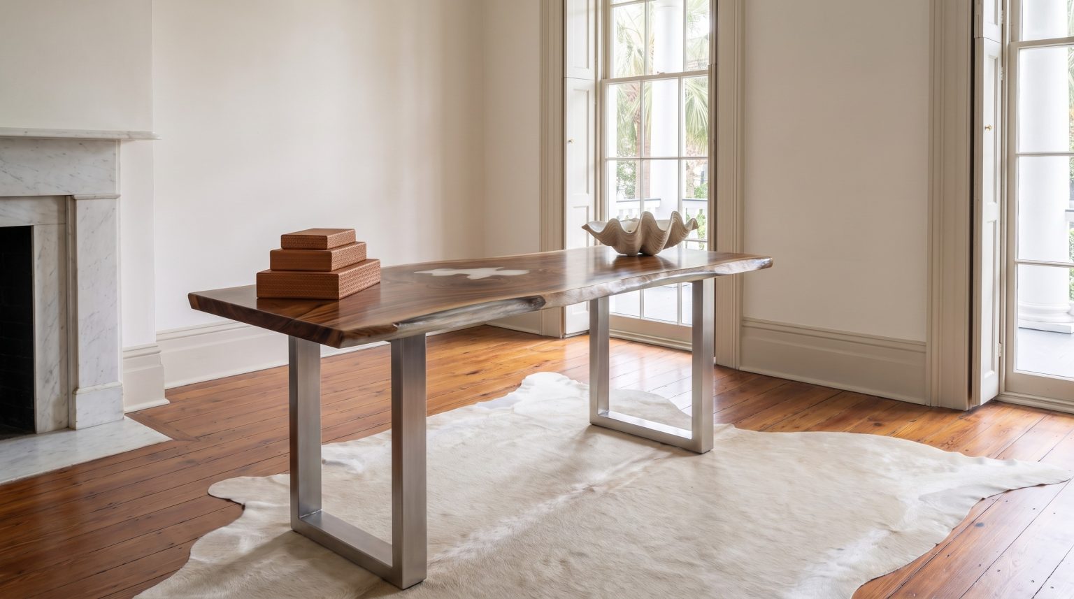 The slab desk: The full desk on brushed steel frame legs.