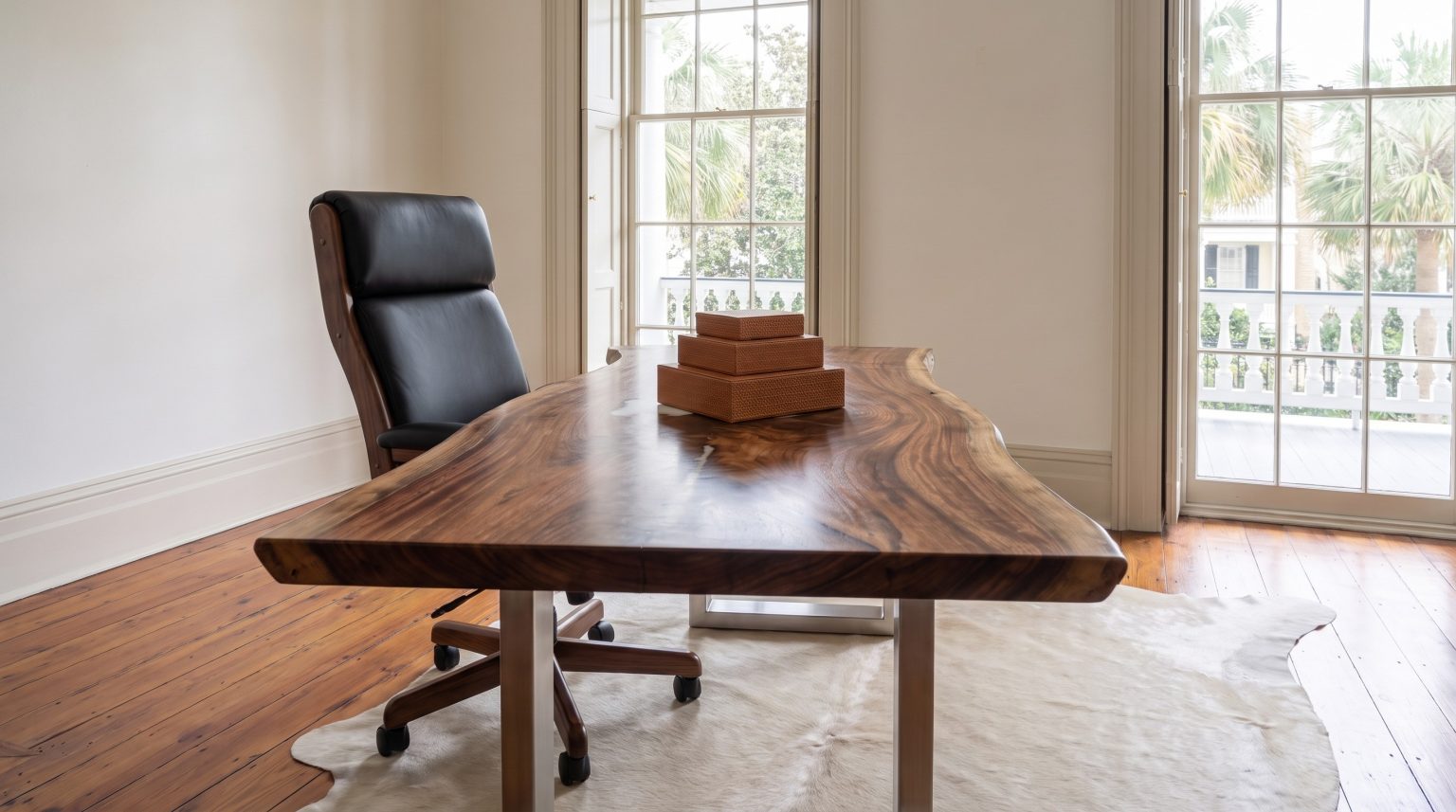 Desk and chair: Across the slab toward the chair pulled up behind it.