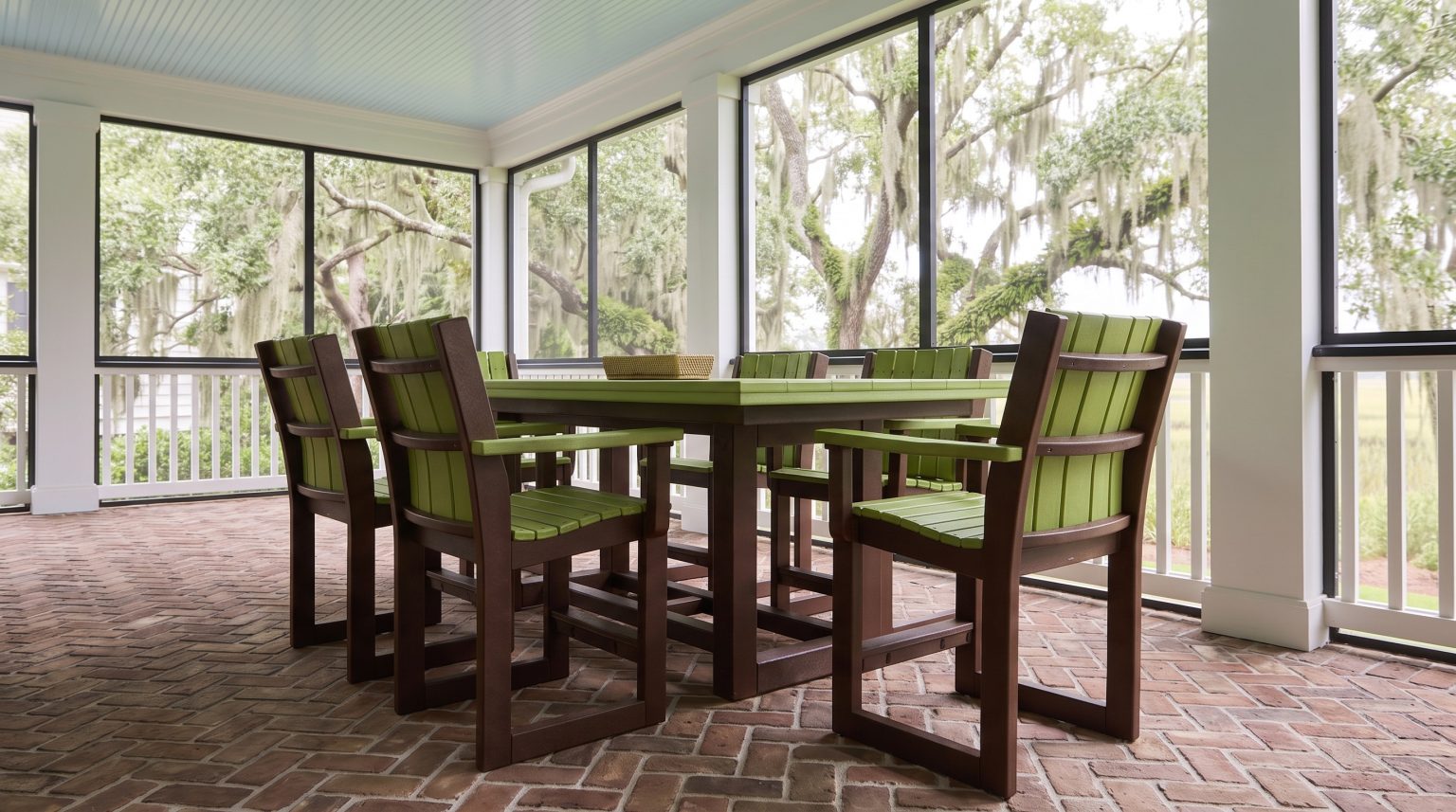 Table and chairs: The lime top with two sled-side armchairs.