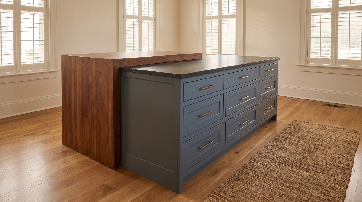 The drawer side: Two banks of slate blue drawers with brass pulls.