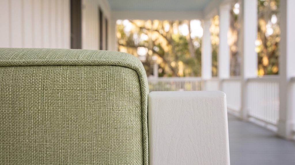 Celery on white: A woven celery cushion against a white arm cap.