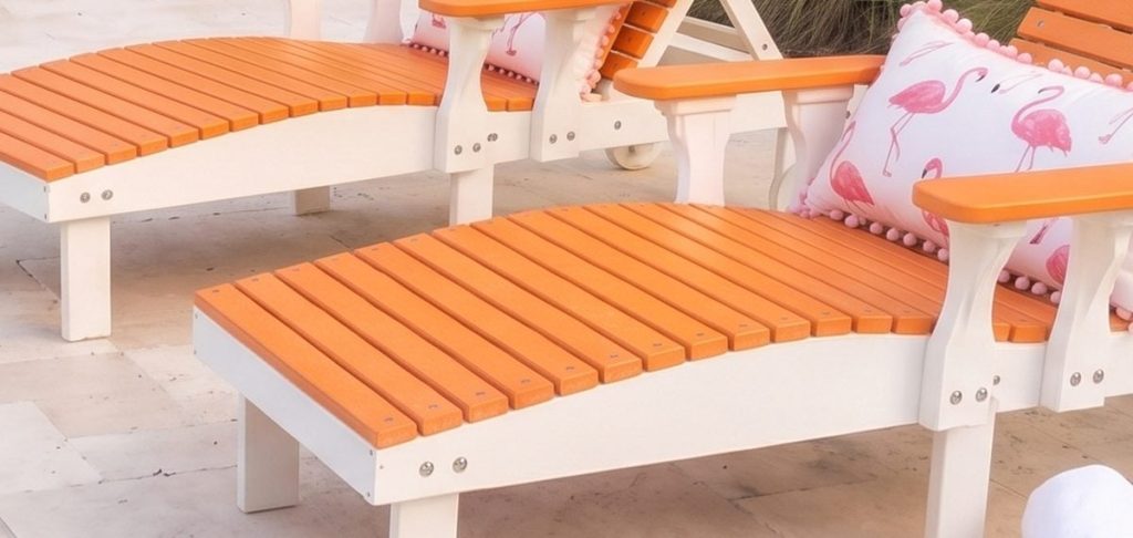 Detail of the slatted poly chaise seat in Tangerine