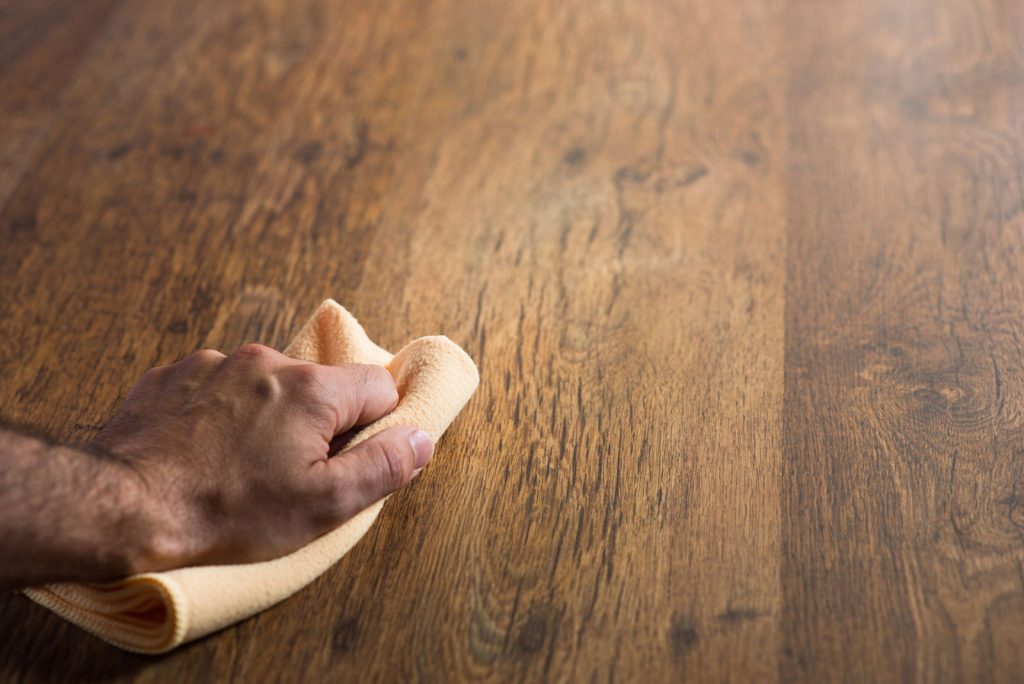 Stained hardwood surface showing grain and color