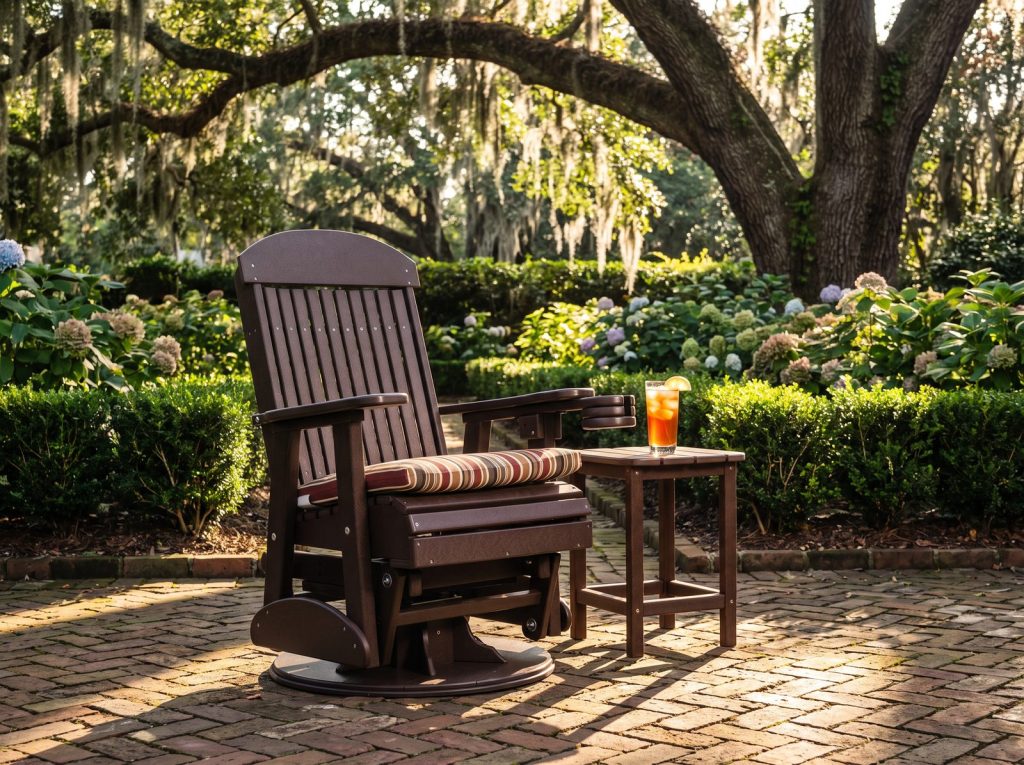 Amish poly swivel glider chair on a brick patio under a live oak
